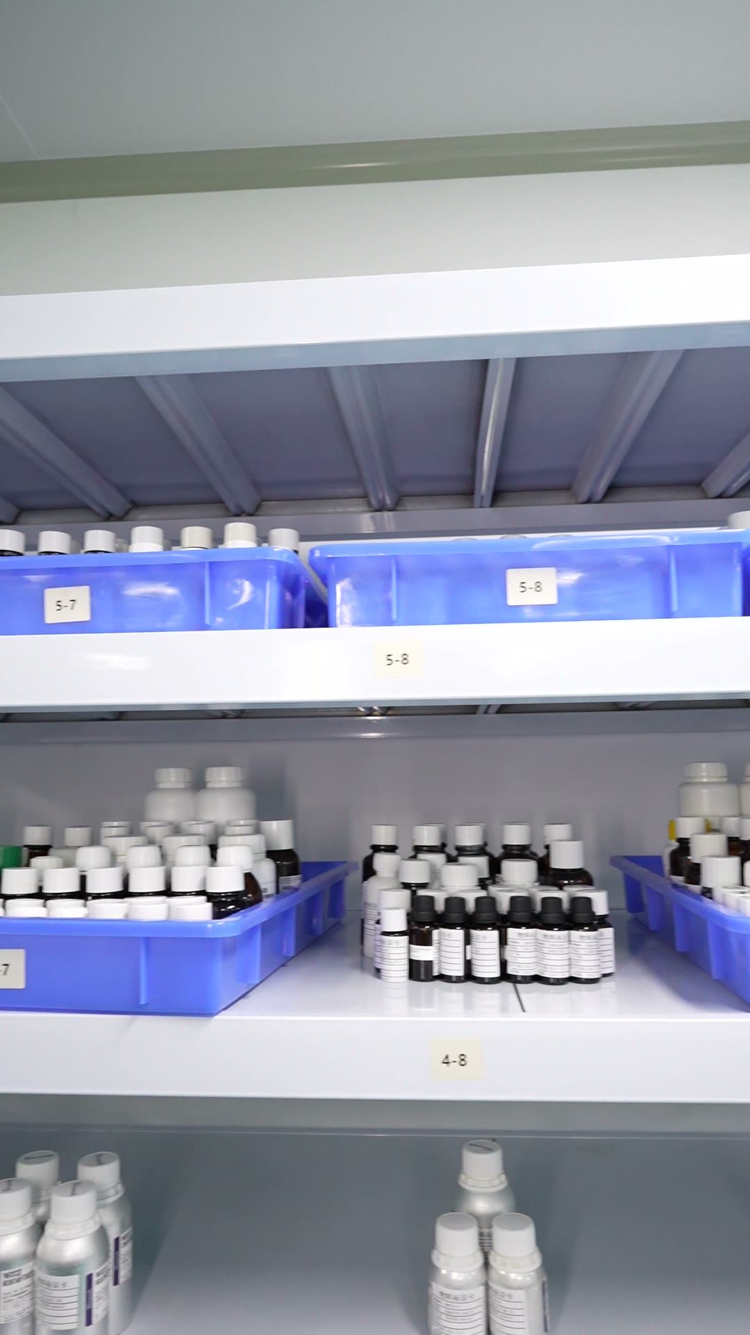 Shelves of fragrance oil samples in the lab